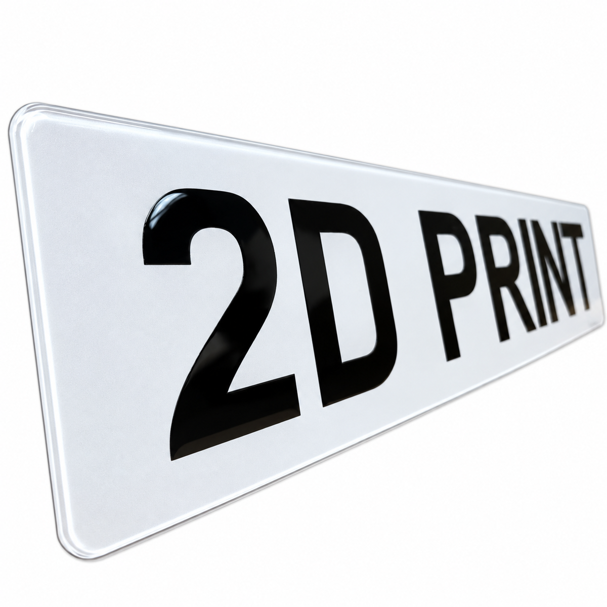 A white rectangular sign with rounded corners and the text '2D PRINT' in large black letters, shown at an angle on a plain white background.